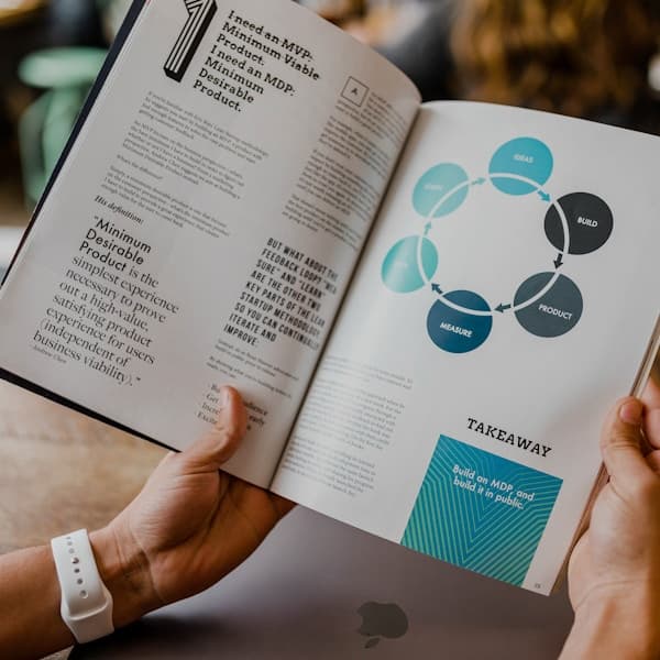 Investor meeting reviewing financial documents